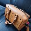 M.C.M SMALL E/W SOFT BERLIN CROSSBODY IN VISETOS ไอเท็มใหม่ในดีไซน์ทรงกระเป๋าเดินทางแบบคลาสสิค ย่อส่วนมาให้ใช้งานได้แบบสบายๆ พกพาสะดวก แมทช์ได้ทุกสไตล์ ใช้ได้แบบ unisex ใช้งานง่ายด้วยหูจับในตัว และซิปหลัก อะไหล่สีดำดูมีมิติตัดกับสีน้ำตาลคอนยัคได้เป็นอย่าง
