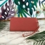 CHARLES & KEITH CLASSIC ZIP AROUND WALLET กระเป๋าเงินใบยาวซิปรอบ มีสายคล้องมีสีเข้ากระเป๋า 1 เส้น ใช้งานง่ายมากๆ คล้องมือก็เก๋ ด้านหน้าปั๊มโลโก้แบรนด์ เปิดปิดด้วยซิปรอบ ที่สายคล้องมือแต่งหมุดสีสวยเด่น ถอดสายได้ จุบัตรได้ 12 ใบ มีช่องซิปใส่เหรียญและช่องใส่