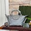 LONGCHAMP LE PLIAGE NÉO TOP HANDLE BAG XS คอลเลคชั่นสุดพิเศษจากลองฌอมป์ มีดีไซน์ที่เรียบหรูและคลาสสิก แฝงด้วยลูกเล่นแบบเฟมินีน แถมยังมีน้ำหนักเบาอย่างไม่น่าเชื่อ มาพร้อมกับหูจับกระเป๋าคู่และฝาปิดแบบกระดุม กระเป๋าถือใบนี้สามารถใช้ถือแบบทั่วไป มีสายสะพายถอด