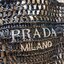 PRADA RAFFIA TOTE BAG สวยไม่ซ้ำใคร สไตล์บีช เหมาะมากกับการสะพายไปเที่ยวทะเล หรือจะใช้ในวันสบายๆก็ตอบโจทย์ กับกระเป๋าสะพายสานใบใหญ่ ตัวกระเป๋าเป็นวัสดุสังเคราห์จากธรรมชาติ