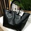Givenchy Black Soft Leather Shoulder Handbags (Limited edition) กระเป๋าถือหรือสะพายพรีเมี่ยมของเเท้จาก "Givenchy Perfume Counter" วัสดุหนังนิ่มเรียบสีดำด้านหน้าปั้มโลโก้แบรนด์ GV ภายใน Polyester 100% สีดำสกรีนโลโก้สวยดูดี เปิดปิดด้วยกระดุมแม่เหล