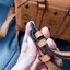 M.C.M SMALL E/W SOFT BERLIN CROSSBODY IN VISETOS ไอเท็มใหม่ในดีไซน์ทรงกระเป๋าเดินทางแบบคลาสสิค ย่อส่วนมาให้ใช้งานได้แบบสบายๆ พกพาสะดวก แมทช์ได้ทุกสไตล์ ใช้ได้แบบ unisex ใช้งานง่ายด้วยหูจับในตัว และซิปหลัก อะไหล่สีดำดูมีมิติตัดกับสีน้ำตาลคอนยัคได้เป็นอย่าง