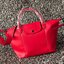Longchamp Le Pliage Cuir Top handle bag S เรียกว่าเป็นกระเป๋าอีกหนึ่งรุ่นที่ไม่ว่ายังไงก็ฮอตฮิตและติดเทรนด์ตลอดไม่เคยเปลี่ยนกับ ทรง Le Pliage Cuir หนึ่งในตระกูลกระเป๋าสุดไอคอนิกจากแบรนด์