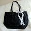 NEW! Chanel Shopping Bag with Ribbin พรีเมี่ยมกิ้ฟของแท้จาก Chanel Cosmetic Counter วัสดุ Polyester & Nylon เนื้อหนาตัดหนังเรียบสีดำเพิ่มความแข็งแรงอยู่ทรง เปิดปิดด้วยซิปสะดวกใช้ น้ำหนักเบา จุสุดๆค่ะ ภายในมีช่องซิปและช่องใส่ของหลายช่อง ใส่เอกสาร A4 หนังสื