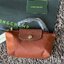 LONGCHAMP LE PLIAGE ORIGINAL Pouch with handle กระเป๋าถือขนาดมินิทรงpouch ให้ความหรูหราจาก Le Pliage (เลอ ปลิยาจ) ในขณะที่ที่ปิดแบบซิปช่วยให้คุณมั่นใจได้