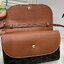 CELINE WALLET ON STRAP / CELINE TRIOMPHE CLUTCH กระเป๋าสะพายข้างใบเล็กสวยคลาสสิค สวยตะโกน งานเป๊ะปัง มีสายสะพายหนังสีน้ำตาล ถอดสายออกเพื่อเป็นกระเป๋าถือทรงคลัชท์เปลี่ยนลุคช์ ลวดลายtriomphe ความเป็นแบรนด์ CELINE ได้อย่างชัดเจน ให้ความรู้สึกที่ดูวินเทจ ที่ส