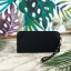 CHARLES & KEITH CLASSIC ZIP AROUND WALLET กระเป๋าเงินใบยาวซิปรอบ มีสายคล้องมีสีเข้ากระเป๋า 1 เส้น ใช้งานง่ายมากๆ คล้องมือก็เก๋ ด้านหน้าปั๊มโลโก้แบรนด์ เปิดปิดด้วยซิปรอบ ที่สายคล้องมือแต่งหมุดสีสวยเด่น ถอดสายได้ จุบัตรได้ 12 ใบ มีช่องซิปใส่เหรียญและช่องใส่