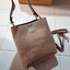 COACH 1011 SMALL TOWN BUCKET BAG รุ่นยอดนิยมใบเล็ก กระเป๋าทรงบัคเก็ต สีคลาสสิคเรียบหรู ตัดกับโลโก้สีทองดูโดดเด่น วัสดุหนัง pepble สวยคมทุกมุมจริงๆ!! เปิด-ปิดด้วยกระดุมแม่เหล็กทั้ง 2 ฝั่ง ภายในเป็นช่องโล่ง มาพร้อมสายสะพายปรับได้ตามตัว ขนาดใบนี้กำลังสวย สะพ