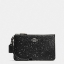 Coach Star Glitter Corner Zip Wristlet / FACTORY HK กระเป๋าคล้องมือทรงคลัช ตัวกระเป๋าตกแต่งกริ๊ตเตอร์ ด้านหน้าติดอะไหล่แบรนด์ สวยหรู เปิดปิดด้วยซิป ด้านในบุผ้ากำหยี่สามารถใส่โทรศัพท์มือถือได้ทุกรุ่น มาพร้อมสายคล้องมือ 1เส้น MUST HAVE!!