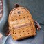SMALL M.C.M STARK STUDS SMALL BACKPACK IN VISETOS Best seller Unisex backpack กระเป๋าเป้ดีไซน์เอกลักษณ์ รุ่นขายดี ใช้ได้ทั้งหนุ่มๆและสาวๆ ตกแต่งหมุดอะไหล่สี gun metal เรียบหรู วัสดุหนังแคนวาสคุณภาพดี เปิด-ปิดด้วยซิป ภายในโล่งกว้าง จุของได้เยอะ สายสะพายสาม
