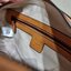 M.C.M SMALL E/W SOFT BERLIN CROSSBODY IN VISETOS ไอเท็มใหม่ในดีไซน์ทรงกระเป๋าเดินทางแบบคลาสสิค ย่อส่วนมาให้ใช้งานได้แบบสบายๆ พกพาสะดวก แมทช์ได้ทุกสไตล์ ใช้ได้แบบ unisex ใช้งานง่ายด้วยหูจับในตัว และซิปหลัก อะไหล่สีดำดูมีมิติตัดกับสีน้ำตาลคอนยัคได้เป็นอย่าง