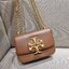 TORY BURCH ELEANOR SMALL CONVERTIBLE SHOULDER BAG ฮอตไอเท็ม รุ่นนี้ขายดีขายหมด คัมแบค!! สวยหรู คุณหนู ผู้ดี!! หายากมากที่สุด!! กระเป๋าสะพายข้าง ดีไซน์อยู่ทรง ขนาดกำลังสะดวกใช้สำหรับสาว วัสดุหนังแท้เต็มใบ สีทูโทน เปิด-ปิดด้วยแถบแม่เหล็ก ภายในแบ่งสัดส่วนได้