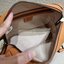 M.C.M SMALL E/W SOFT BERLIN CROSSBODY IN VISETOS ไอเท็มใหม่ในดีไซน์ทรงกระเป๋าเดินทางแบบคลาสสิค ย่อส่วนมาให้ใช้งานได้แบบสบายๆ พกพาสะดวก แมทช์ได้ทุกสไตล์ ใช้ได้แบบ unisex ใช้งานง่ายด้วยหูจับในตัว และซิปหลัก อะไหล่สีดำดูมีมิติตัดกับสีน้ำตาลคอนยัคได้เป็นอย่าง