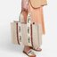 CHLOÉ Woody large leather-trimmed cotton-canvas tote กระเป๋าแบรนด์ดังจากสัญชาติฝรั่งเศส เป็นที่ชื่นชอบของเซเลบริตี โคลเอ้รุ่นนี้เป็นสไตล์วินเทจ เรียบหรูและดูดี ออกแบบมาเพื่อการใช้งานที่ง่ายแสนง่าย และยังจุของได้ไม่น้อยเลยทีเดียว เพิ่มความมีเสน่ห์และแข็งแร