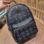 SMALL M.C.M STARK STUDS SMALL BACKPACK IN VISETOS Best seller Unisex backpack กระเป๋าเป้ดีไซน์เอกลักษณ์ รุ่นขายดี ใช้ได้ทั้งหนุ่มๆและสาวๆ ตกแต่งหมุดอะไหล่สี gun metal เรียบหรู วัสดุหนังแคนวาสคุณภาพดี เปิด-ปิดด้วยซิป ภายในโล่งกว้าง จุของได้เยอะ สายสะพายสาม