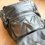 Kipling Matta Small Metallic Backpack กระเป๋าเป้ขนาดกำลังดี วัสดุไนล่อนเคลือบกันน้ำ มีน้ำหนักเบา มีช่องเก็บของหลายช่อง แบ่งเป็นช่องด้านหน้า 2 ช่องและด้านข้างอีก 2 ช่อง ช่องใหญ่ปิดเปิดด้วยซิปคู่ภายในมีช่องซิป ช่องใส่ของจุกจิกและสายห้อยพวงกุญแจ ด้านหน้าประด