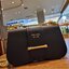 PRADA FRAGRANCE SHOULDER BAG WITH GWP ไอเท็มสุดโปรดที่ควรค่าแก่การครอบครองและเก็บสะสม กระเป๋าสะพายไหล่ สวยคม สีดำคลาสสิคตัดกับอะไหล่ทองเป็นอย่างดี วัสดุหนังแท้เต็มใบ เปิดปิดด้วยแถบหนังสอดในช่อง ใช้งานสะดวก พกพาง่าย ขนาดกำลังสวย สายสะพายในตัว สะพายได้หลากห