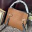 Tory burch lee radziwill pebbled small double bag กระเป๋า Lee Radziwill Double Bag สุดหรู ที่คำนึงถึงการเลเยอร์หนังและหนังกลับอย่างประณีตลงไปในงานดีไซน์ สามารถปรับปากกระเป๋าได้ 3 แบบตามต้องการ พร้อมนำเอาความเป็น American Luxury มาตีความใหม่ผ่านแง่มุมของคว