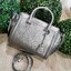 CHARLES & KEITH SAFFIANO TRAPEZE BAG กระเป๋าถือหรือสะพายรุ่นยอดนิยมดีไซน์สวยหรูวัสดุหนังคาเวียร์อยู่ทรง ด้านข้างเเต่งหนังช่องตัดดูมีดีเทล ด้านหน้ามีโลโก้ ด้านหลังมีช่องซิป เปิดปิดด้วยซิปหัวซิปแบรนด์ หูจับเเข็งแรง พับลงได้ พร้อมสายสะพายหนังปรับระดับได้ถอดไ