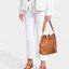 หนังแท้ M.C.M Essential Visetos Original Drawstring Small Cognac / M.C.M Aren Drawstring Bag in Visetos Original กระเป๋าสะพายทรง bucket ขนาดน่าใช้ ภายในเป็นช่องโล่งกว้าง จุของได้เยอะ งานหนังแท้ทั้งใบ ใต้กระเป๋ามีหมุดรองฐานอย่างดี ช่วยถนอมกระเป๋า สายสะพายส