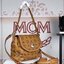 M.C.M Gold Visetos Small Crossbody Bag กระเป๋าสะพายข้างที่เหมาะกับทุกโมเม้นต์ของการเดินทาง และการใช้ชีวิตประจำวัน สีคอนยัคออริจินัลพิมพ์ลาย Visetos เพื่อความคลาสสิก ทุกสไตล์ด้วยทรงเอกลักษณ์เฉพาะรุ่น ลองถือด้วยมือหรือสายแบบคาดลำตัวถอดออกได้ช่วยให้สาม