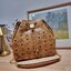 M.C.M Klassik Drawstring Bag in Visetos - Small กระเป๋าสะพายทรง bucket ไซส์ใหญ่ ขนาดใส่ของได้แบบจุใจ **สินค้าเกรดท็อปออริจินอล 1:1 สลับแท้ ใช้งานต่างประเทศได้