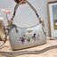 Coach X Peanuts Teri Shoulder Bag With Snoopy And Friends Motif CE861 คอลเลคชั่นสุดคิ้วท์ ไม่ให้ช้อปยังไงไหว!! กับกระเป๋าสะพายไหล่กึ่งทรงพอช พร้อมเสิร์ฟความสวยถึงบ้านไปเลยก่อนใคร แบบไม่ต้องพรีฯ ด้วยดีไซน์ลวดลายกาน์ตูนยอดฮิต มาพร้อมสายสะพาย 2 เส้น