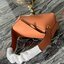 Loewe Puzzle Hobo bag กระเป๋ารุ่น Puzzle มีความพิเศษในหลายด้าน ไม่ว่าจะเป็นรูปทรงที่แปลกใหม่ มินิมอลด้วยโลโก้อนาแกรมแบบประทับ ดูหรู เป็นกระเป๋า Unisex ที่ไม่ว่าคุณจะเป็นผู้หญิงหรือผู้ชายก็ใช้งานได้ ลายกระเป๋าได้มาจากการนำหนังมาเย็บต่อกันทั้งหมด ถึงแม้ว่าข