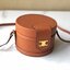 CELINE MEDIUM TAMBOUR IN SMOOTH CALFSKIN BAG กระเป๋าทรงกลมสวยหรูอยู่ทรงเปิดปิดด้วยฝาปิดกระดุมโลโก้แบรนด์ ภายในโล่ง