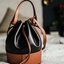 พรีเมี่ยมกิ๊ฟแท้ 100% 】LOEWE LEATHER BUCKET BAG VIP GIFT WITH PURCHASE GWP กระเป๋าถือหรือสะพายหนังแท้พรีเมี่ยมกิ๊ฟ Limited จาก LOEWE PERFUME DUTYFREE COUNTER รุ่นใหม่ล่าสุด Rare items สุดเลอค่า วัสดุหนังแท้ Lambskin หนังสวยอยู่ทรง ขนาดใหญ่กำลังดี น้ำหนักเ