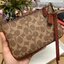 ของแท้ COACH SMALL WRISTLET IN COLORBLOCK SIGNATURE ((32445)) ✔️กระเป๋าคล้องมือ วัสดหนัง pvc อย่างดี ลายซิกเนเจอร์
