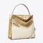 Tory burch lee radziwill pebbled small double bag กระเป๋า Lee Radziwill Double Bag สุดหรู ที่คำนึงถึงการเลเยอร์หนังและหนังกลับอย่างประณีตลงไปในงานดีไซน์ สามารถปรับปากกระเป๋าได้ 3 แบบตามต้องการ พร้อมนำเอาความเป็น American Luxury มาตีความใหม่ผ่านแง่มุมของคว