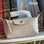 LONGCHAMP LE PLIAGE CITY POUCH WITH HANDLE Taupe - Canvas (ไม่มีสายยาว) กระเป๋าเครื่องสำอางแบบมีซิปพร้อมหูหิ้วใบนี้เหมาะสำหรับการจัดระเบียบกระเป๋าของคุณ