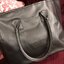 Givenchy Black Soft Leather Shoulder Handbags (Limited edition) กระเป๋าถือหรือสะพายพรีเมี่ยมของเเท้จาก "Givenchy Perfume Counter" วัสดุหนังนิ่มเรียบสีดำด้านหน้าปั้มโลโก้แบรนด์ GV ภายใน Polyester 100% สีดำสกรีนโลโก้สวยดูดี เปิดปิดด้วยกระดุมแม่เหล