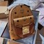 M.C.M PATRICIA BACKPACK IN VISETOS กระเป๋าสะพายไซส์ x-mini ดีเทลละเอียด ลูกเล่นเยอะ สายสะพายปรับใช้ได้หลากหลายสไตล์ ชิคมาก ปังมากค่ะแม่!! สะพายเป็นเป้ สะพายครอสบอดี้ หรือสะพายคาดอกก็ยังได้ หรือเอาสายออก ถือเดี่ยวๆก็สวยได้ไม่ธรรมดา วัสดุหนังแคนวาสคุณภาพดี 