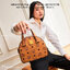 M.C.M MINI ESSENTIAL HALF MOON DISCO TOTE IN VISETOS กระเป๋าถือ/สะพายข้างไอเท็มรุ่นฮิต!! ที่เหล่าดาราเซเลป และไอดอลคนดังมีติดตัว เป็นรุ่นที่แมทช์ง่ายมากๆ