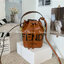 FENDI MON TRESOR MINI LEATHER BUCKET IN BROWN ทรงขนมจีบสุดฮิต! เปิดปิดด้วยตัวเปิดแบบรูด ภายในมีช่องใส่ของหลัก ใส่กระเป๋าสตางค์กลาง + มือถือได้ ทรงนี้กำลังมาแรงมาก อะไหล่ทอง มีสายให้สองแบบ ปรับเปลี่ยนลุคได้ง่าย พร้อมส่งที่ไทยราคาสุดคุ้มห้ามพลาดค่ะ!