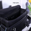 Prada Nylon and Saffiano Leather Bag with Strap กระเป๋าสะพายแบบ Crossbody ใช้ได้ทั้งหญิงชาย มาพร้อมกระเป๋าใส่เหรียญใบเล็กน่ารัก เปิด-ปิดด้วยตัวล็อค ด้านในยังแบ่งช่องเป็นสัดส่วน จุของได้เยอะ ซับในด้วยผ้าพิมพ์ลายแบรนด์อย่างดี และยังมี 1 ช่องซิปด้านหลัง สายส
