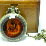 **พร้อมส่ง**นาฬิกาสร้อยคอ  ลายMockingjay ฝาคริสตัลใสสีส้ม (ฟรีกล่องไม้)